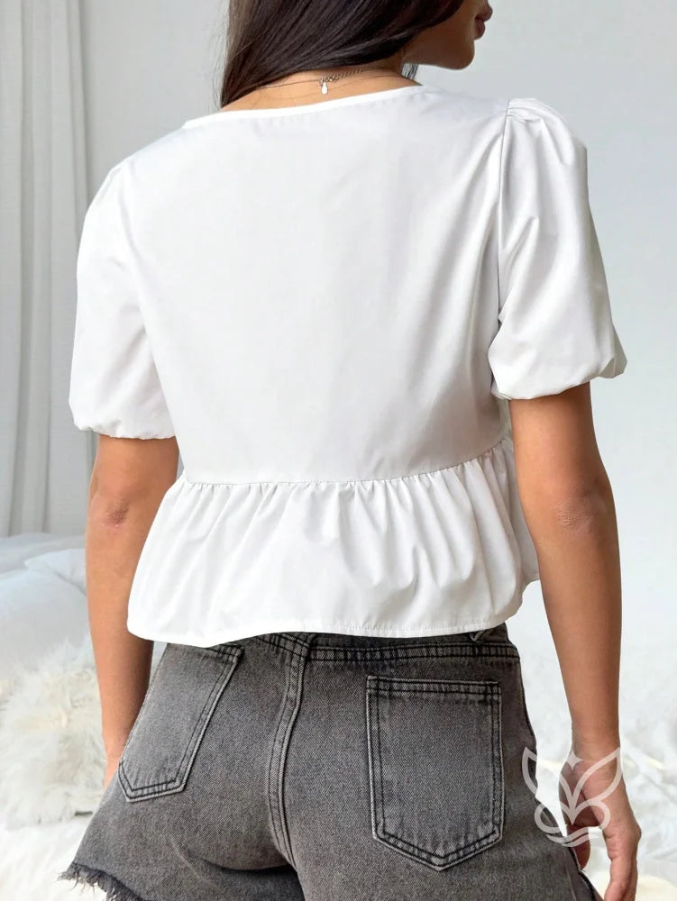 Blusa com Laços Frontais e Manga Curta Bufante Blusa com Laços Frontais e Manga Curta Bufante
