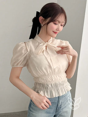 Blusa Com Manga Curta Bufante E Gola Laço Elegante Blusa Com Manga Curta Bufante E Gola Laço Elegante