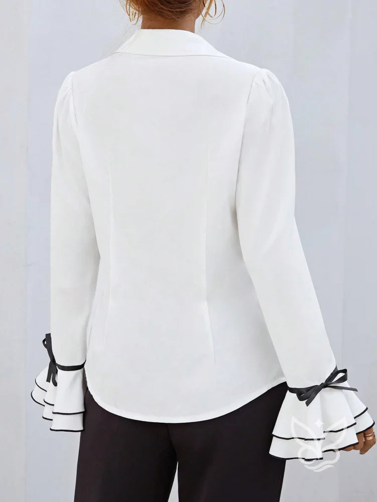 Blusa Com Manga Flare Babados E Contorno Contrastante Blusa Com Manga Flare Babados E Contorno Contrastante