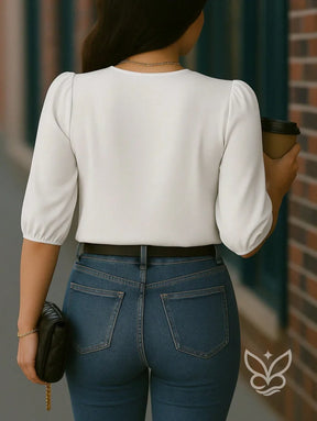 Blusa com Manga Princesa e Caimento Estruturado Blusa com Manga Princesa e Caimento Estruturado