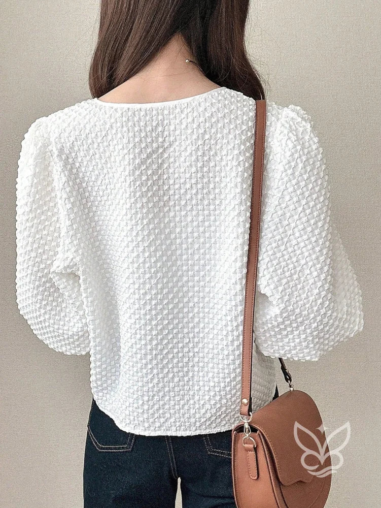Blusa Com Textura Em Tricô E Amarração Frontal Blusa Com Textura Em Tricô E Amarração Frontal