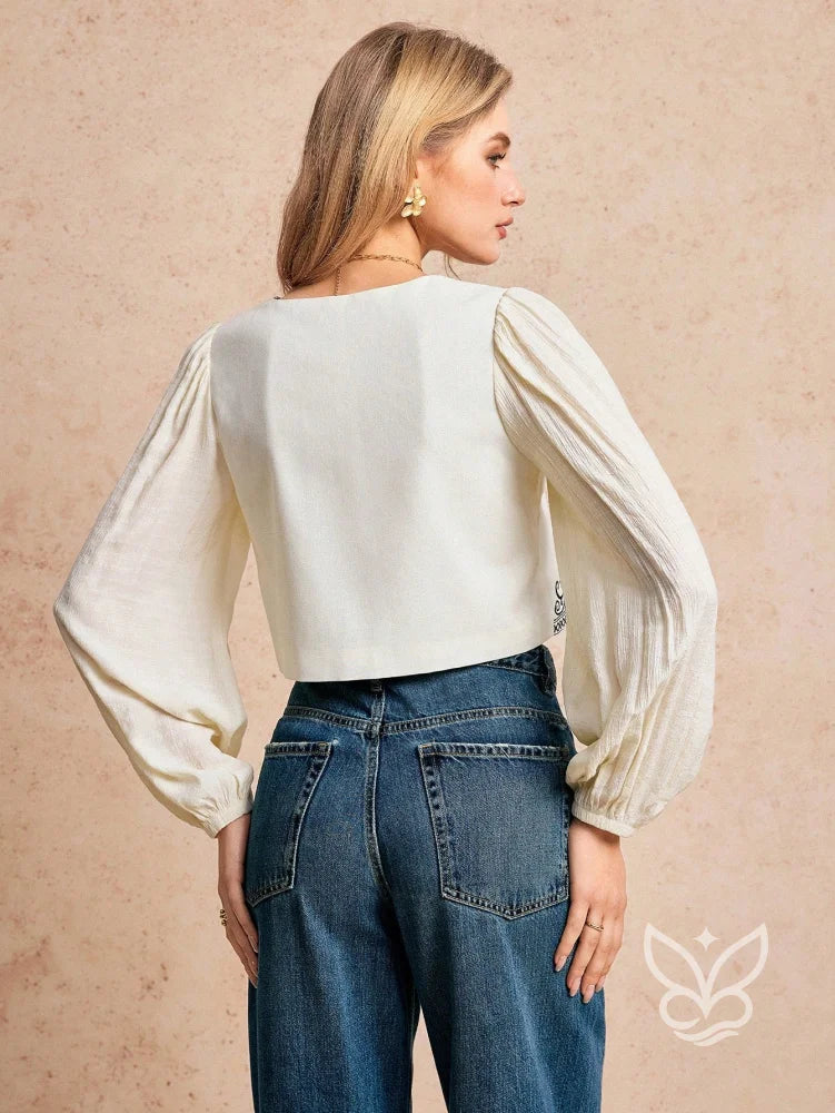 Blusa Cropped Bordada Com Amarração E Mangas Bufantes Blusa Cropped Bordada Com Amarração E Mangas Bufantes