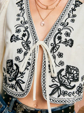 Blusa Cropped Bordada Com Amarração E Mangas Bufantes Blusa Cropped Bordada Com Amarração E Mangas Bufantes