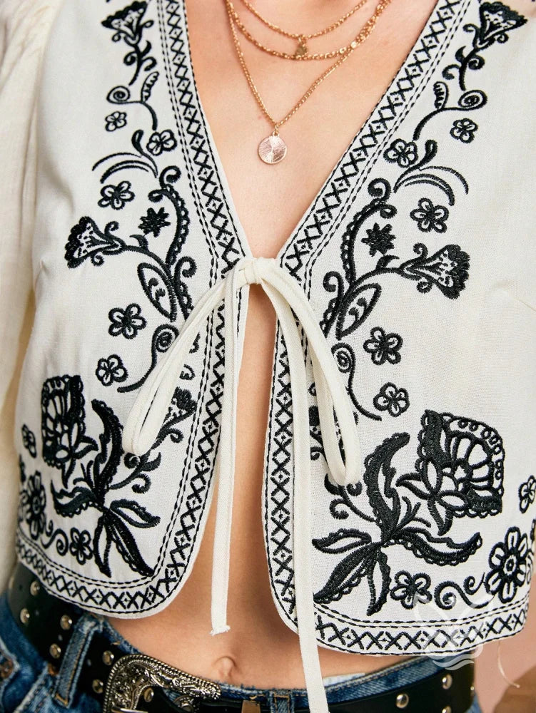 Blusa Cropped Bordada Com Amarração E Mangas Bufantes Blusa Cropped Bordada Com Amarração E Mangas Bufantes