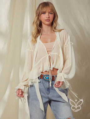 Blusa Cropped Em Tule Com Manga Bufante E Amarração Frontal Blusa Cropped Em Tule Com Manga Bufante E Amarração Frontal