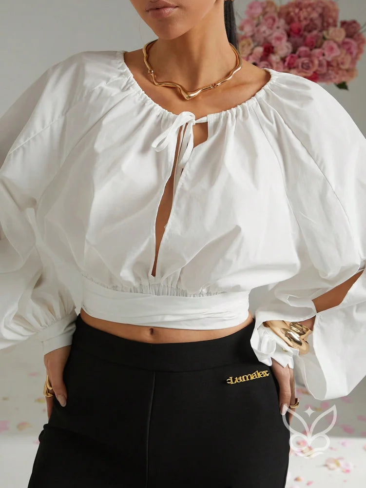Blusa Cropped Manga Longa Amarração No Decote E Punho Bufante Blusa Cropped Manga Longa Amarração No Decote E Punho
