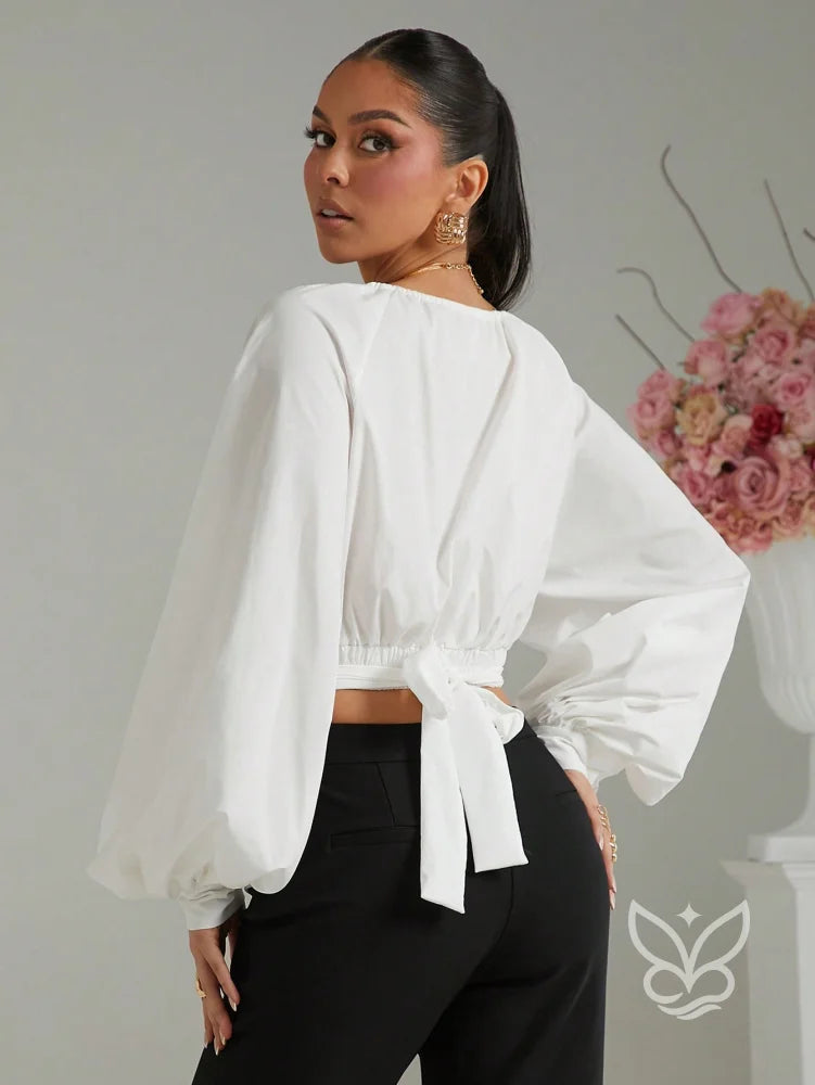 Blusa Cropped Manga Longa Amarração No Decote E Punho Bufante Blusa Cropped Manga Longa Amarração No Decote E Punho