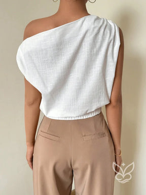Blusa de Um Ombro com Caimento Solto e Elegante Blusa de Um Ombro com Caimento Solto e Elegante