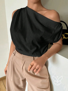Blusa de Um Ombro com Caimento Solto e Elegante Blusa de Um Ombro com Caimento Solto e Elegante