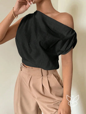 Blusa de Um Ombro com Caimento Solto e Elegante Blusa de Um Ombro com Caimento Solto e Elegante