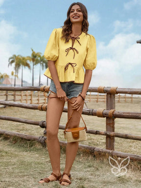 Blusa Em Algodão Com Mangas Bufantes E Amarração Contrastante Blusa Em Algodão Com Mangas Bufantes E Amarração