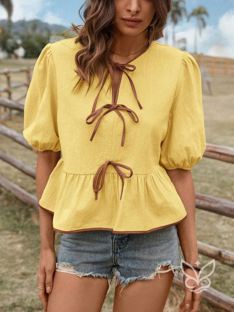 Blusa Em Algodão Com Mangas Bufantes E Amarração Contrastante Blusa Em Algodão Com Mangas Bufantes E Amarração