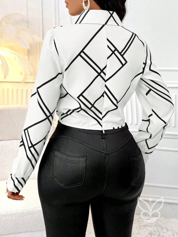 Blusa Estampada Listrada Com Gola Reversível e Manga Longa Blusa Estampada Listrada Com Gola Reversível e Manga Longa