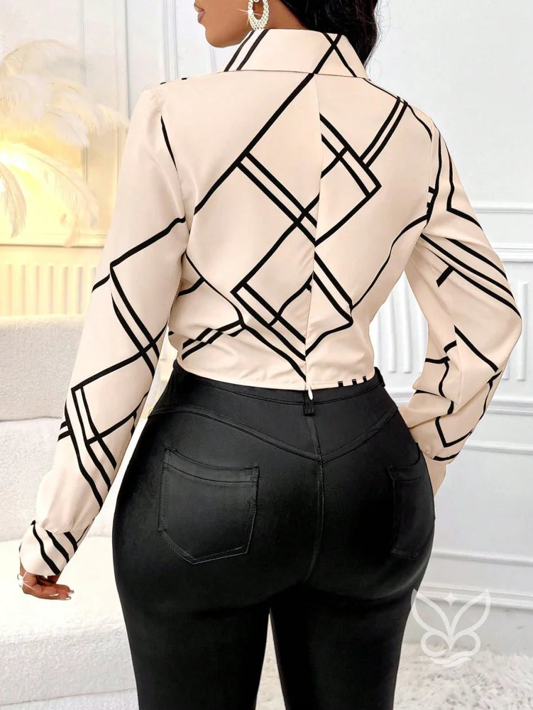 Blusa Estampada Listrada Com Gola Reversível e Manga Longa Blusa Estampada Listrada Com Gola Reversível e Manga Longa