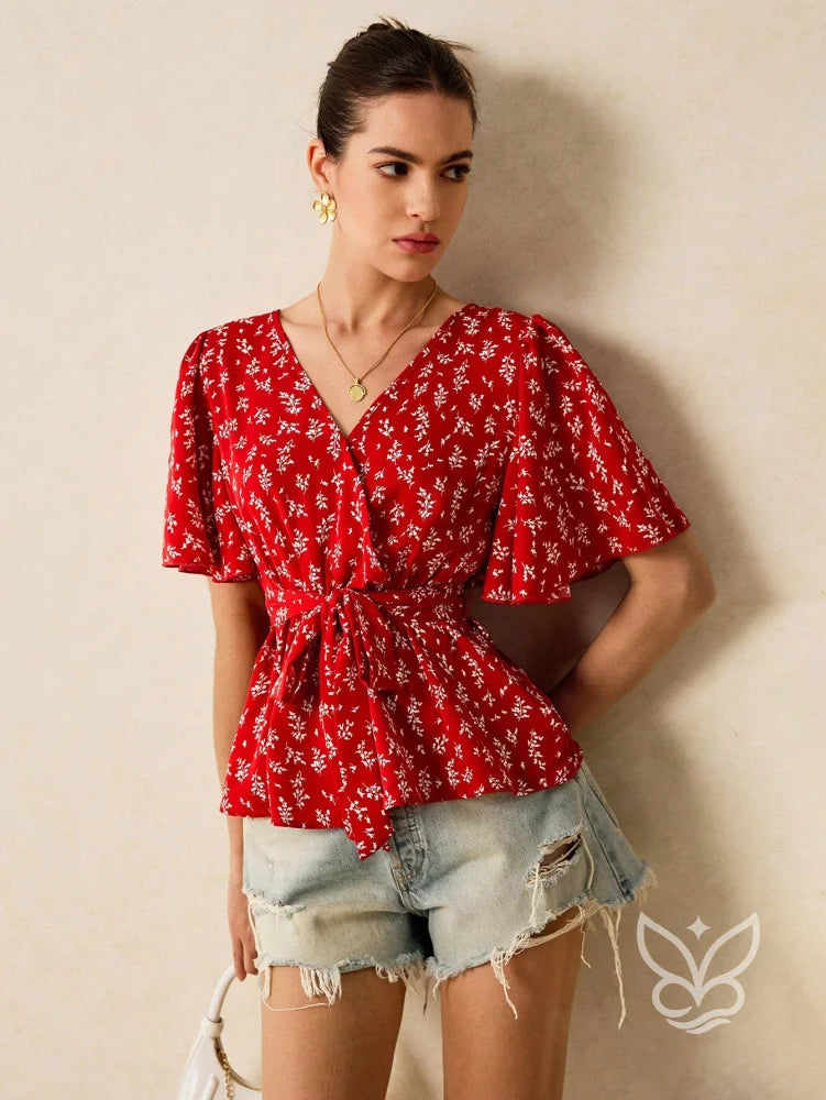 Blusa Floral com Decote V e Cintura Marcada Peplum Vermelho / PP Blusa Floral com Decote V e Cintura Marcada Peplum
