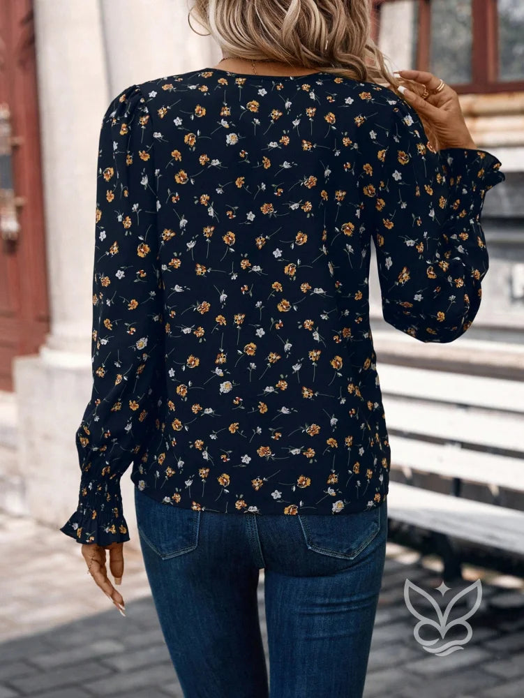 Blusa Floral Com Decote V E Mangas Longas Ajustadas Blusa Floral Com Decote V E Mangas Longas Ajustadas