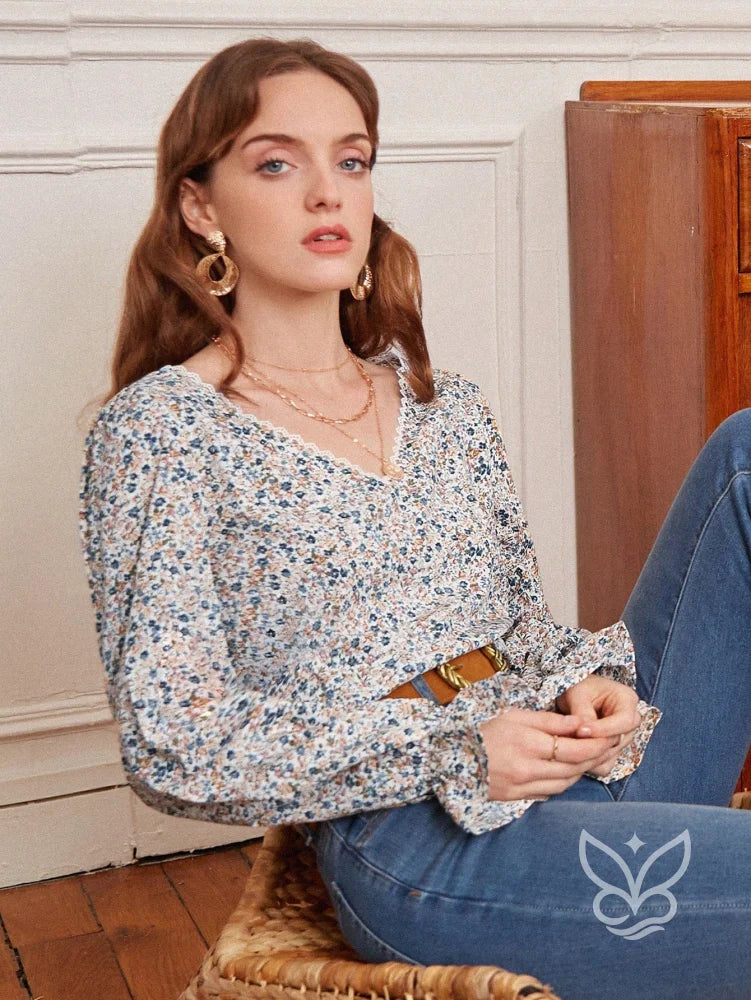 Blusa Floral Com Decote V E Mangas Longas Com Babado Blusa Floral Com Decote V E Mangas Longas Com Babado