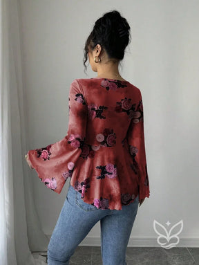 Blusa Floral Transparente Com Manga Flare E Laço Frontal Blusa Floral Transparente Com Manga Flare E Laço Frontal