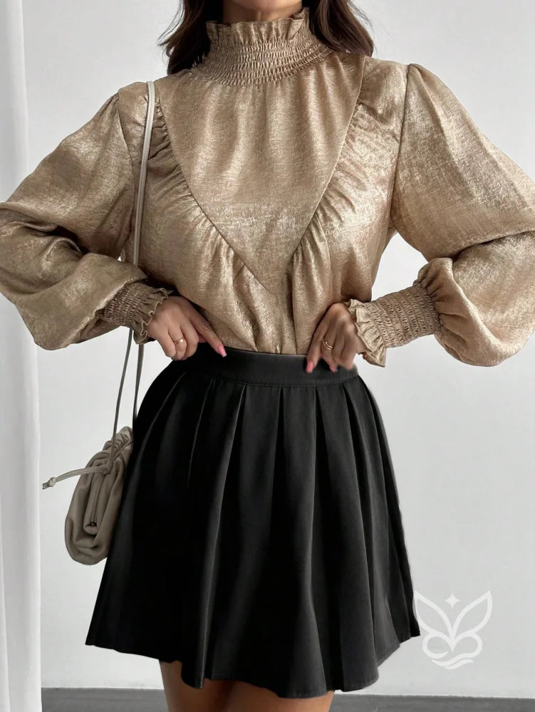 Blusa Gola Alta Com Manga Bufante E Caimento Elegante Blusa Gola Alta Com Manga Bufante E Caimento Elegante