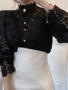 Blusa Gola Alta com Renda Guipir e Manga Bufante Blusa Gola Alta com Renda Guipir e Manga Bufante