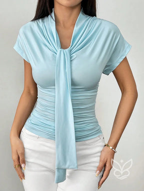 Blusa Justa Com Gola Drapeada E Laço Longo Frontal Blusa Justa Com Gola Drapeada E Laço Longo Frontal