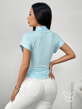 Blusa Justa Com Gola Drapeada E Laço Longo Frontal Blusa Justa Com Gola Drapeada E Laço Longo Frontal