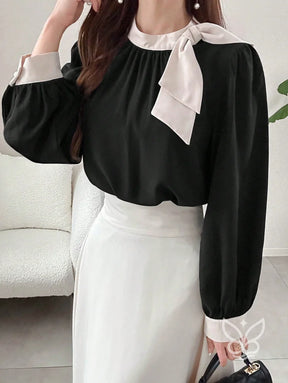 Blusa Manga Bufante Com Gola Alta E Punho Contrastante Blusa Manga Bufante Com Gola Alta E Punho Contrastante