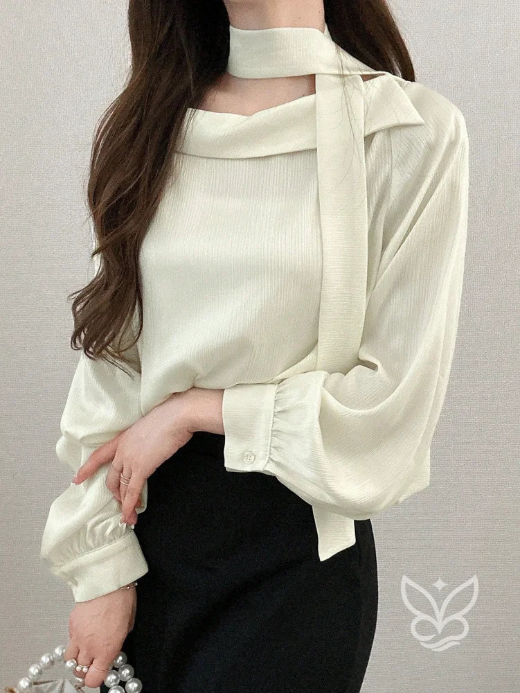 Blusa Manga Bufante Com Gola Laço E Caimento Fluido Blusa Manga Bufante Com Gola Laço E Caimento Fluido