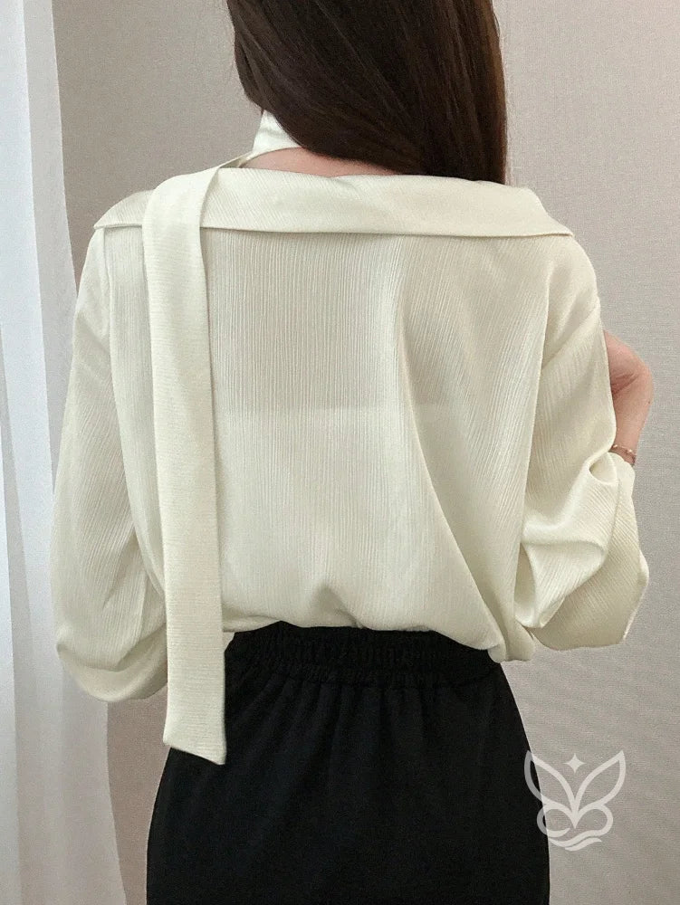 Blusa Manga Bufante Com Gola Laço E Caimento Fluido Blusa Manga Bufante Com Gola Laço E Caimento Fluido