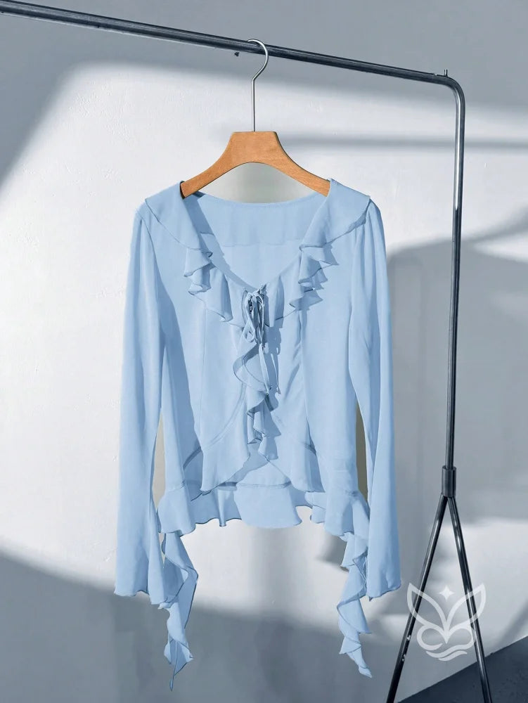 Blusa Manga Longa Babados Assimétricos E Abotoamento Frontal Blusa Manga Longa Babados Assimétricos E Abotoamento