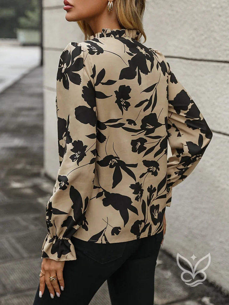Blusa Manga Longa Com Amarração No Decote E Estampa Floral Blusa Manga Longa Com Amarração No Decote E Estampa Floral