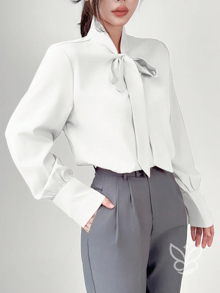 Blusa Manga Longa Com Gola Laço E Caimento Elegante Blusa Manga Longa Com Gola Laço E Caimento Elegante