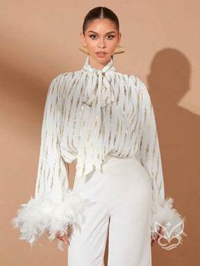 Blusa Manga Longa Com Gola Laço E Detalhes Em Plumas Blusa Manga Longa Com Gola Laço E Detalhes Em Plumas