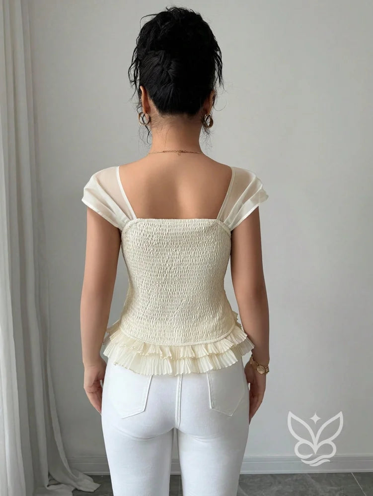 Blusa Peplum Com Babados Manga Bufante E Botões Frontais Blusa Peplum Com Babados Manga Bufante E Botões Frontais