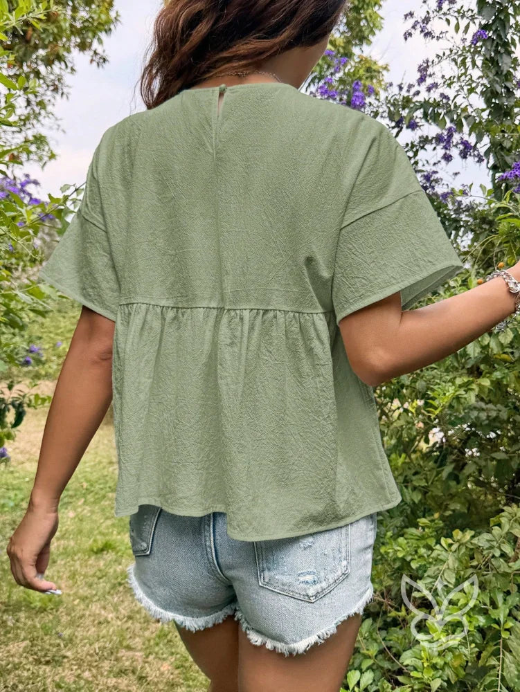 Blusa Peplum com Caimento Solto e Gola Redonda Blusa Peplum com Caimento Solto e Gola Redonda