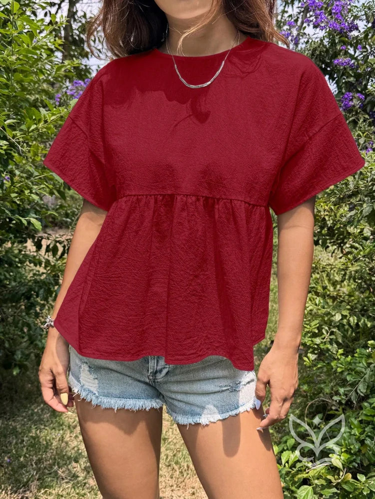 Blusa Peplum com Caimento Solto e Gola Redonda Blusa Peplum com Caimento Solto e Gola Redonda