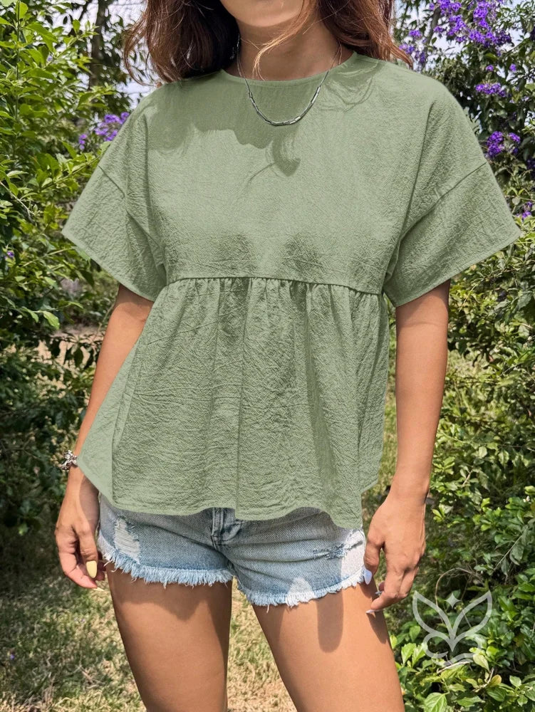 Blusa Peplum com Caimento Solto e Gola Redonda Blusa Peplum com Caimento Solto e Gola Redonda
