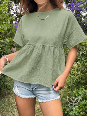 Blusa Peplum com Caimento Solto e Gola Redonda Blusa Peplum com Caimento Solto e Gola Redonda