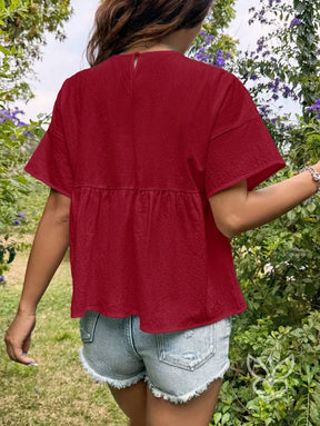 Blusa Peplum com Caimento Solto e Gola Redonda Blusa Peplum com Caimento Solto e Gola Redonda