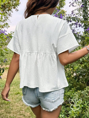 Blusa Peplum com Caimento Solto e Gola Redonda Blusa Peplum com Caimento Solto e Gola Redonda