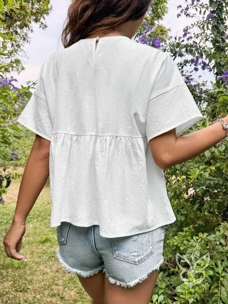 Blusa Peplum com Caimento Solto e Gola Redonda Blusa Peplum com Caimento Solto e Gola Redonda