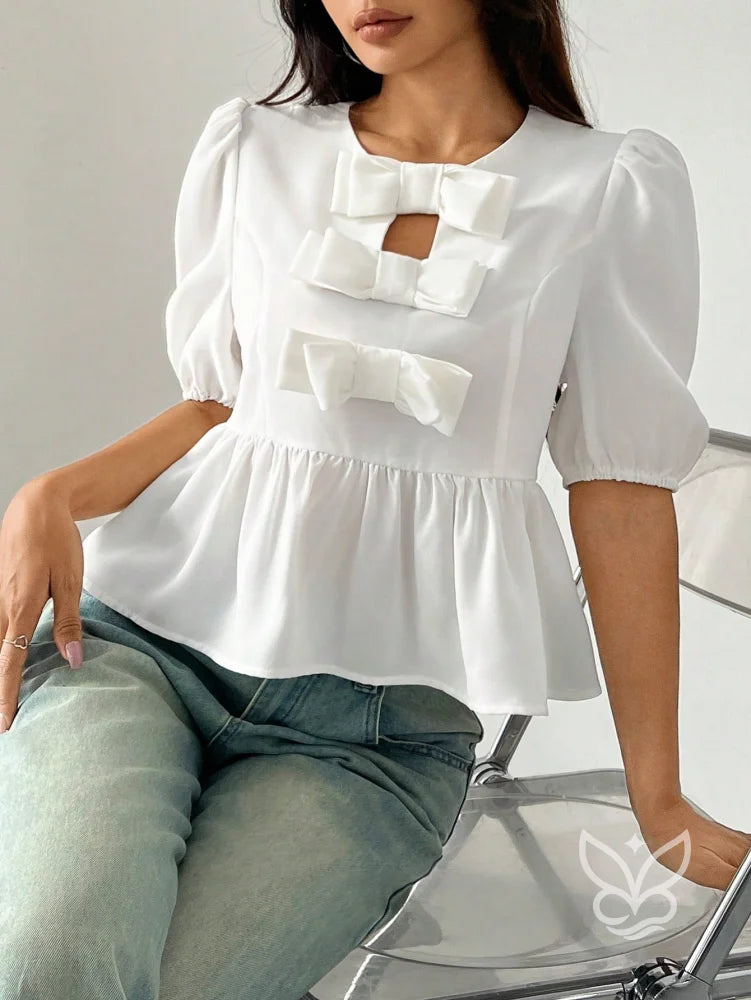 Blusa Peplum com Laços Frontais e Manga Bufante Blusa Peplum com Laços Frontais e Manga Bufante