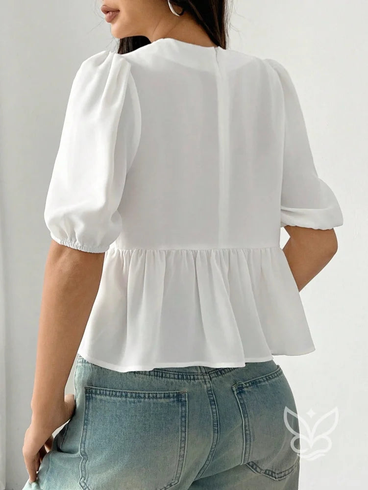Blusa Peplum com Laços Frontais e Manga Bufante Blusa Peplum com Laços Frontais e Manga Bufante