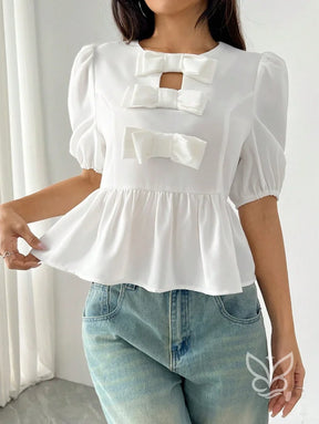 Blusa Peplum com Laços Frontais e Manga Bufante Blusa Peplum com Laços Frontais e Manga Bufante
