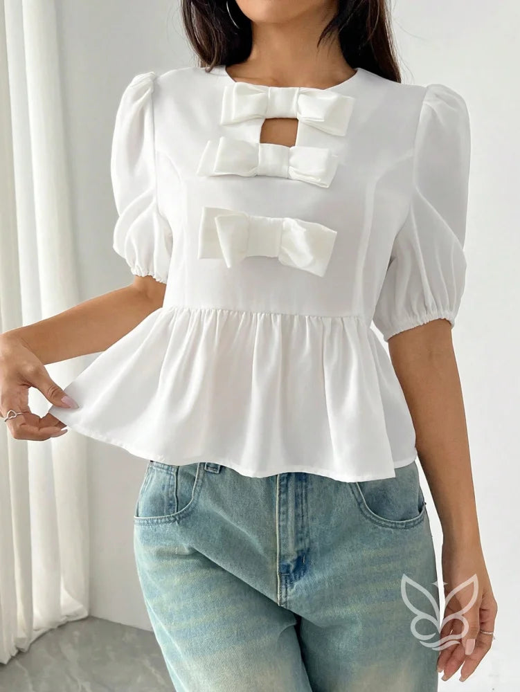 Blusa Peplum com Laços Frontais e Manga Bufante Blusa Peplum com Laços Frontais e Manga Bufante