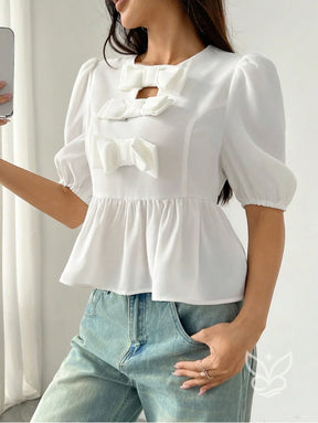 Blusa Peplum com Laços Frontais e Manga Bufante Blusa Peplum com Laços Frontais e Manga Bufante