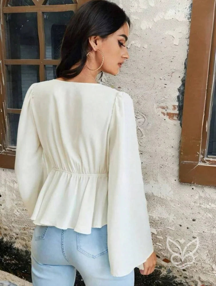 Blusa Peplum Com Mangas Bufantes E Amarração Frontal Blusa Peplum Com Mangas Bufantes E Amarração Frontal