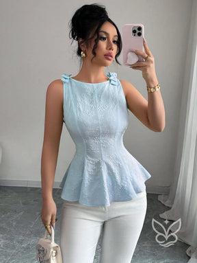 Blusa Peplum Estampa Floral Com Laço Na Alça E Cintura Marcada Blusa Peplum Estampa Floral Com Laço Na Alça E Cintura