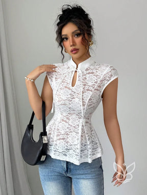 Blusa Peplum Jacquard Com Gola Chinesa E Detalhes Vazados Blusa Peplum Jacquard Com Gola Chinesa E Detalhes Vazados