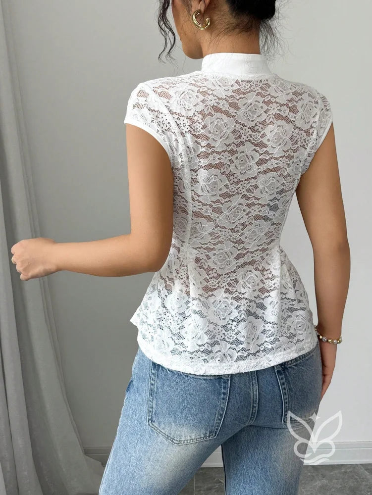 Blusa Peplum Jacquard Com Gola Chinesa E Detalhes Vazados Blusa Peplum Jacquard Com Gola Chinesa E Detalhes Vazados